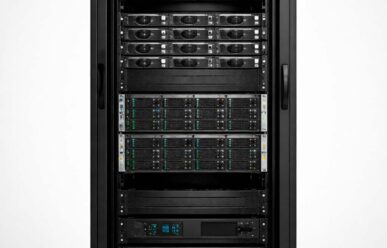 Close-up of a black server cabinet with multiple rack server units installed according to standard 19 inch server rack dimensions.